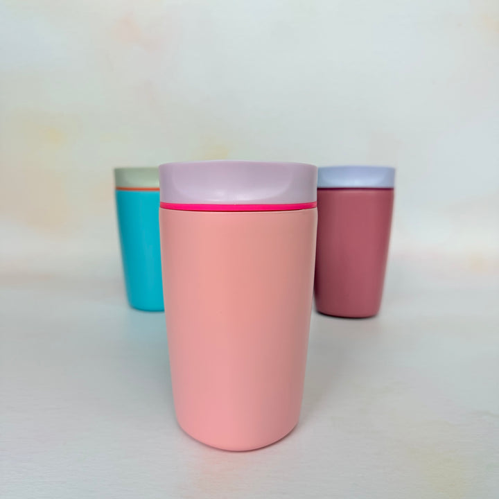 Pink 350ml new coffee cup on a bright background