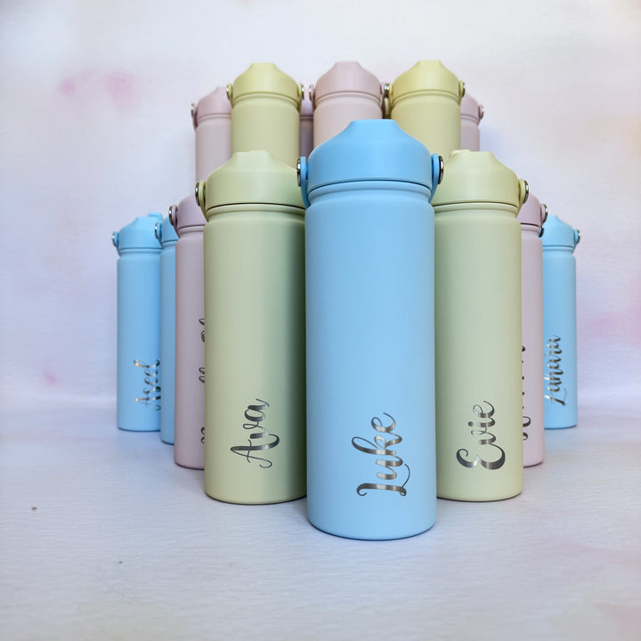 Personalised engraved water bottles in pastel blue, green and pink colours with custom name engraving