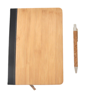 Wooden Bamboo notebook with black binding and a matching pen on a white background