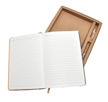 Open notebook with lined pages in a wooden box on a white background
