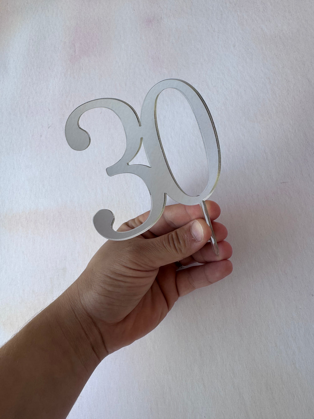 Close-up of silver mirror acrylic number 30 cake topper – personalised mirror number topper – Etch 'N' Shine