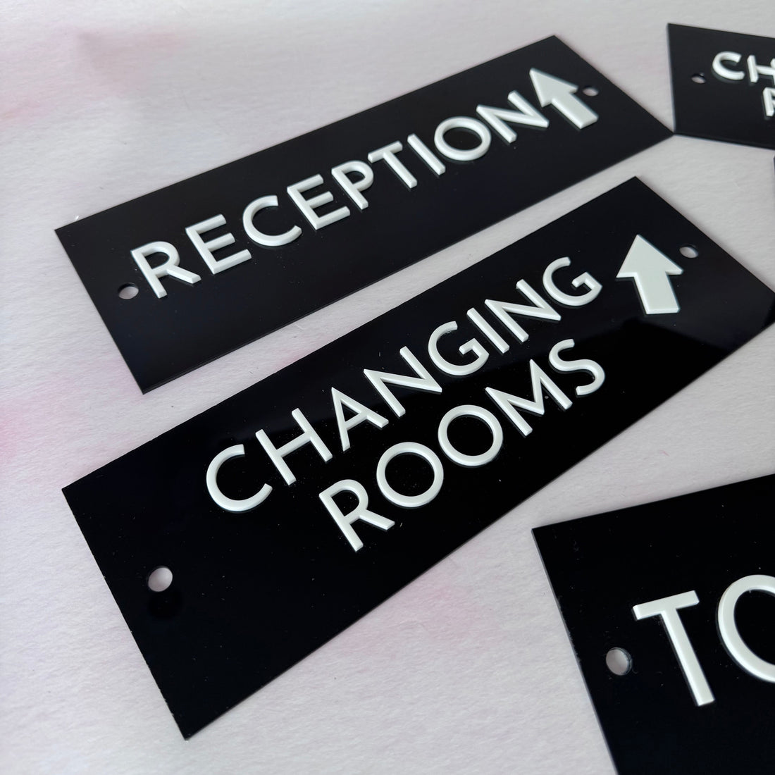 Reception and Changing Rooms signs with directional arrows – black acrylic door signs – Etch 'N' Shine