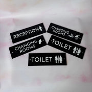 Black acrylic wayfinding set with Reception, Changing Rooms and Toilet signs – custom acrylic door signs – Etch 'N' Shine
