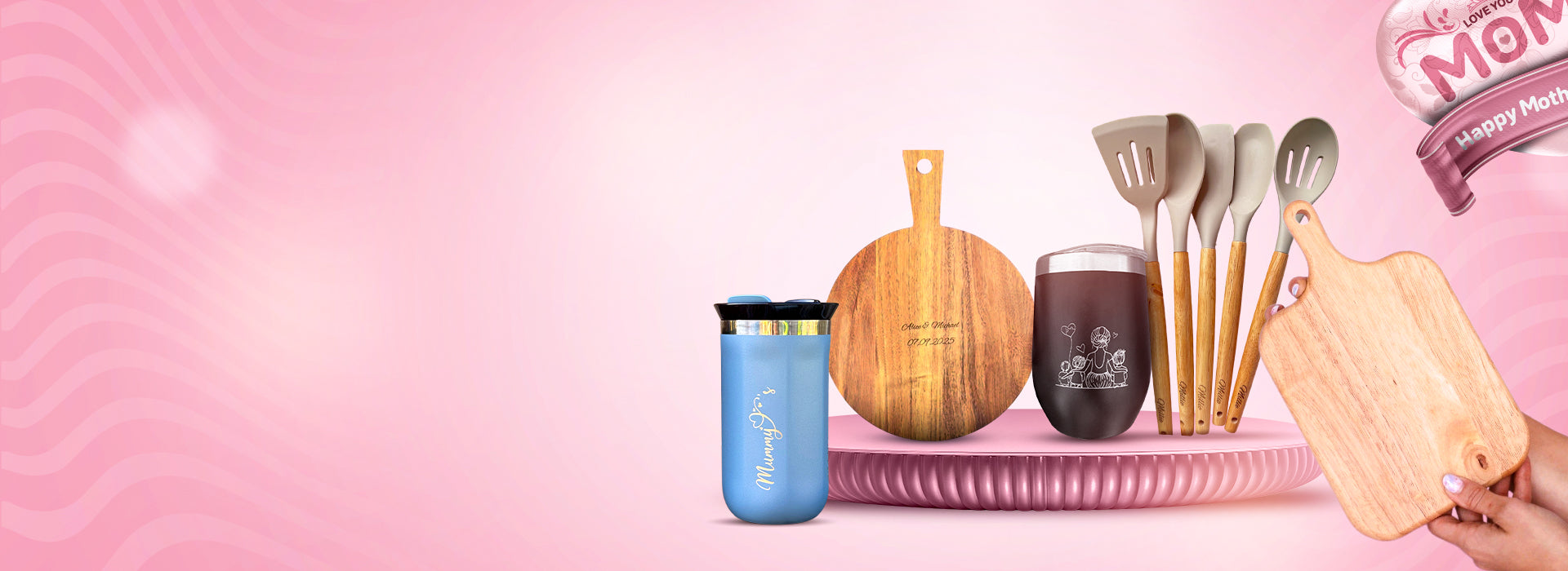 Kitchen utensils and tumbler on a pink background with 'Happy Mother's Day' banner.