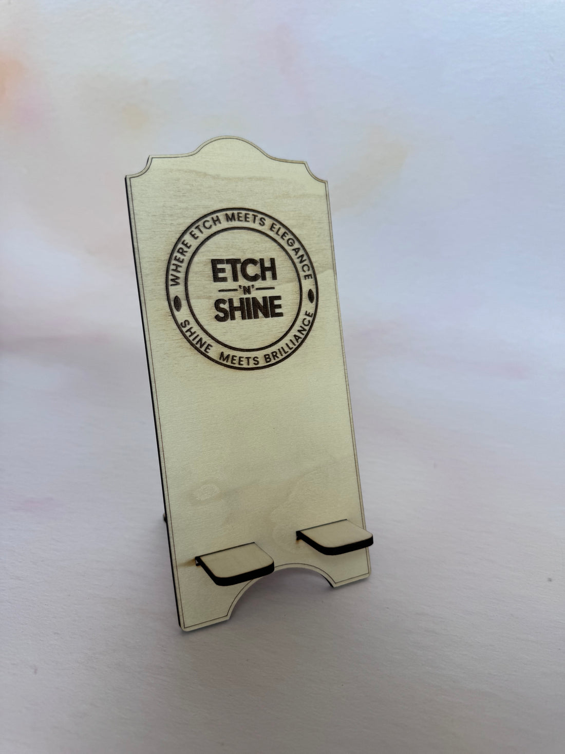 Birch plywood phone stand engraved with a circular logo – personalised wooden phone stand – Etch 'N' Shine