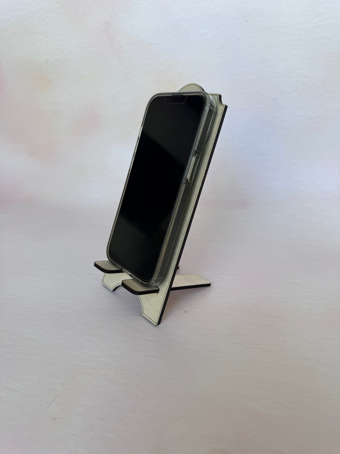 Personalised wooden phone stand holding a phone, third view – Etch 'N' Shine