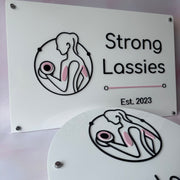 Custom layered acrylic business signs for Strong Lassies gym branding