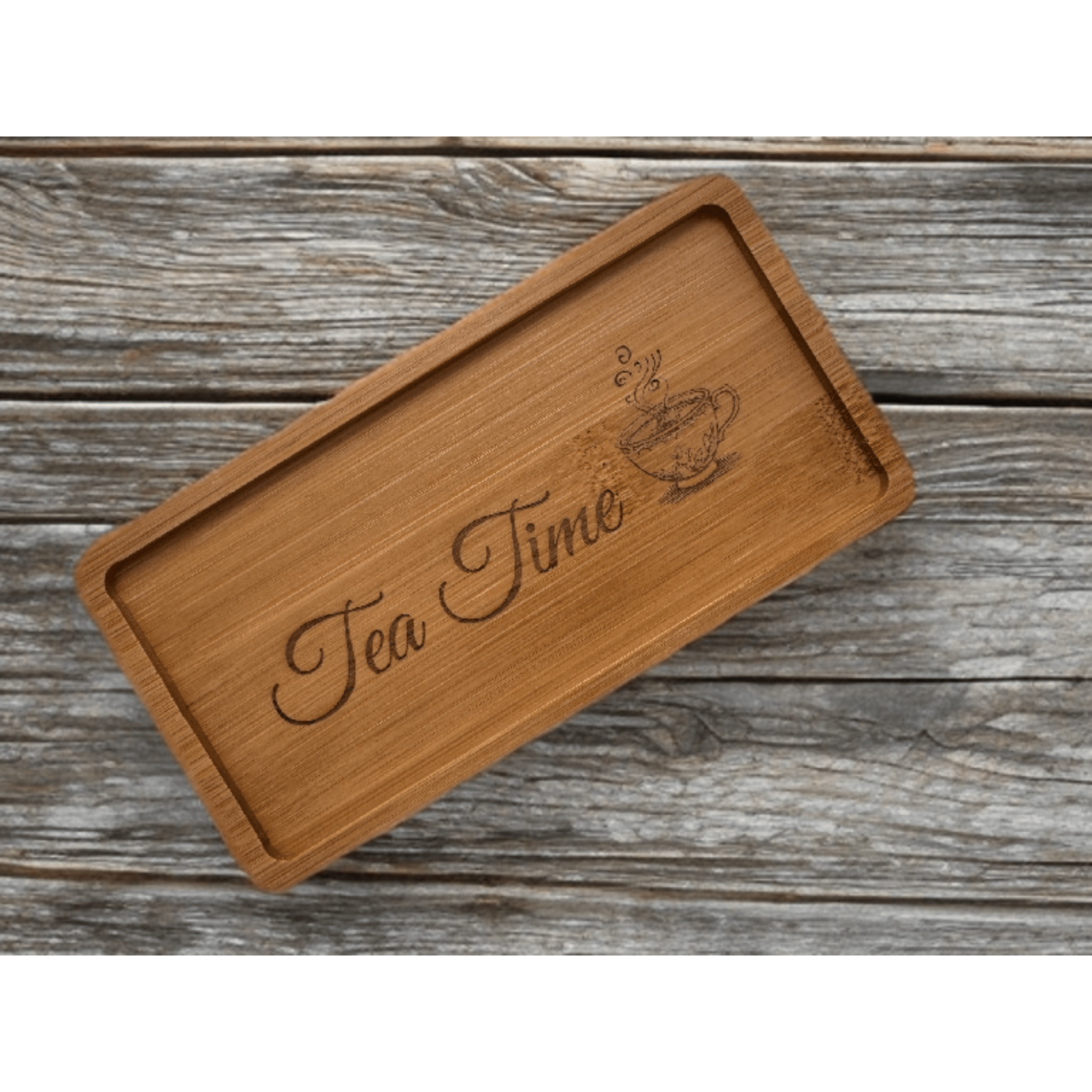 Laser-engraved bamboo serving tray with custom text and teacup motif on a wooden surface – bamboo tray – Etch 'N' Shine