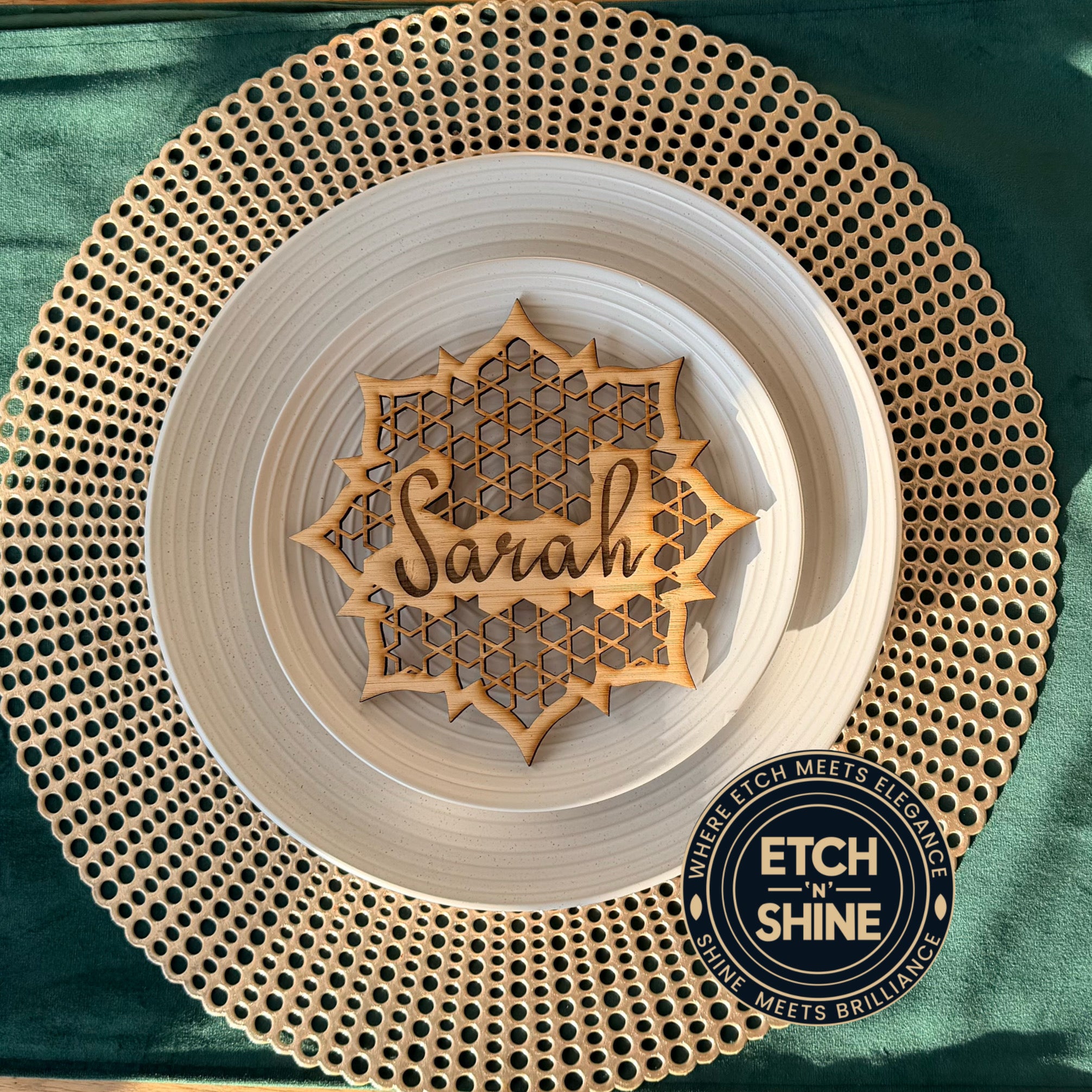 Decorative wooden nameplate with 'Sarah' on a textured surface, branded 'Etch 'n Shine'.