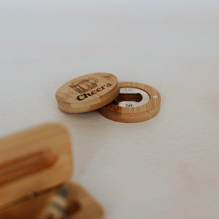 Round bamboo bottle opener with engraved beer mug graphic and custom text, lid removed to show magnetic back – Etch 'N' Shine
