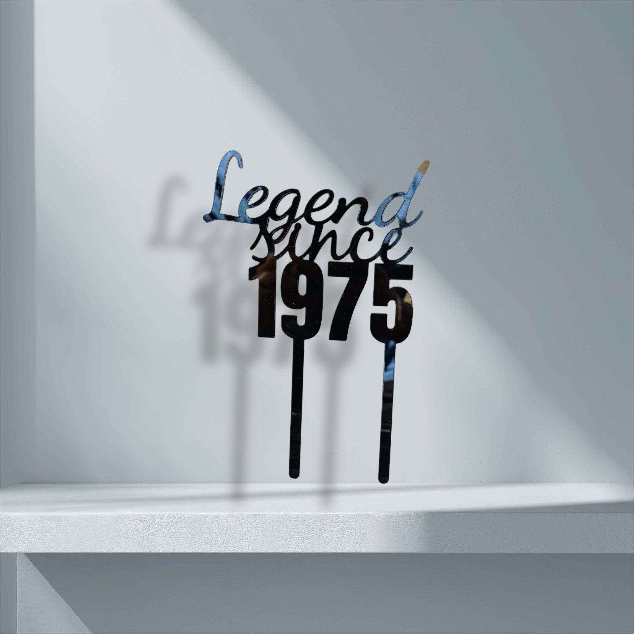 Black acrylic cake topper with custom year on a white shelf – laser-cut personalised acrylic cake topper – Etch 'N' Shine