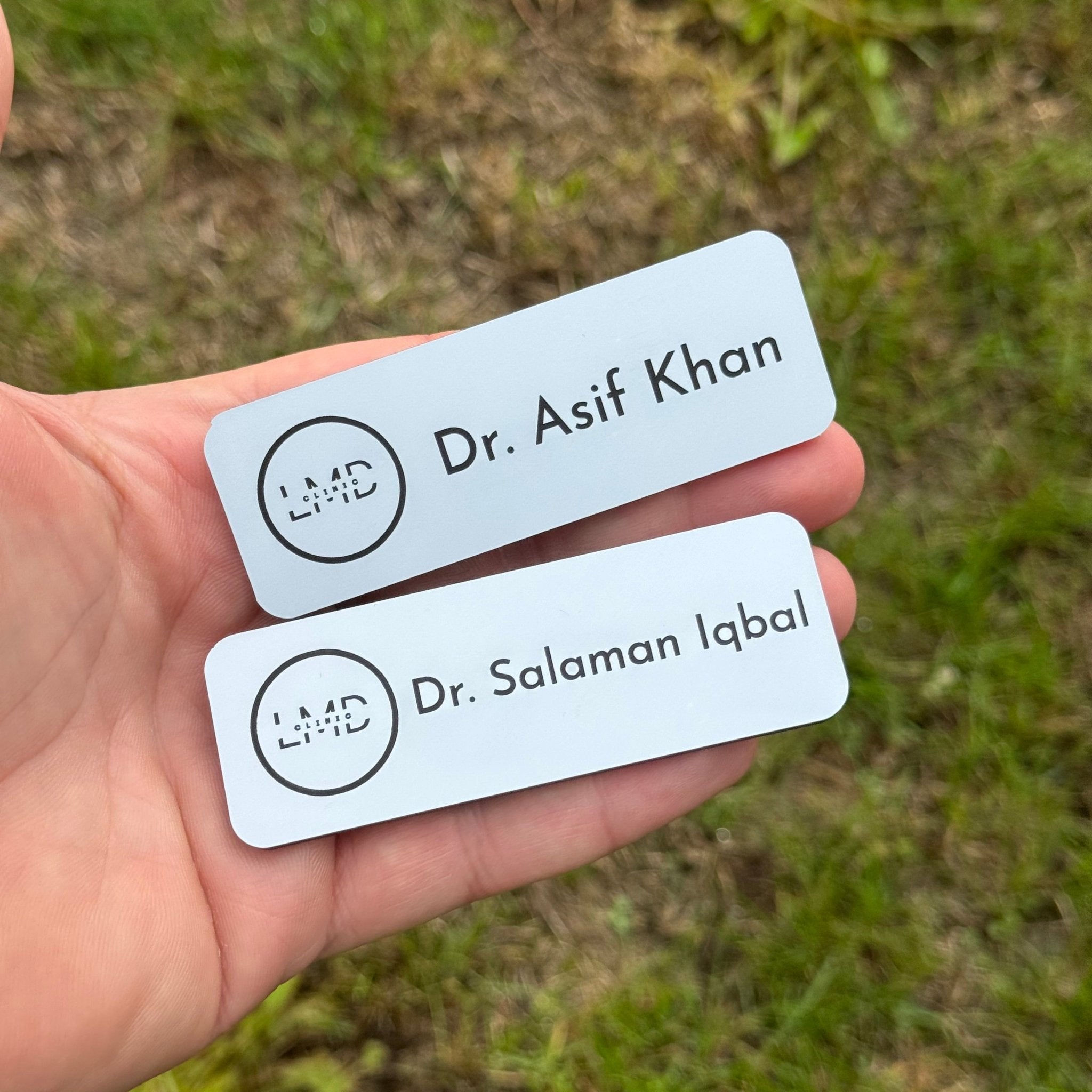 Two engraved acrylic name badges with custom name and logo – personalised magnetic name badges – Etch 'N' Shine