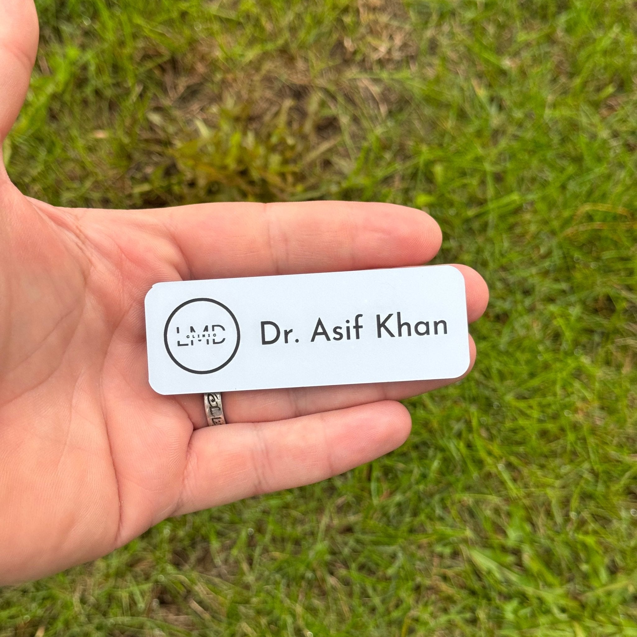 White acrylic name badge with engraved custom name and logo – personalised acrylic name badge – Etch 'N' Shine