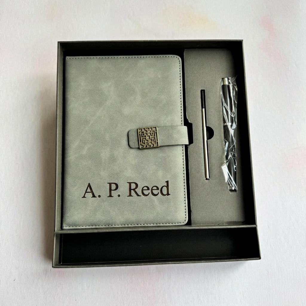 Personalised engraved leather notebook set displayed on a dark surface – personalised notebook gift set – Etch 'N' Shine