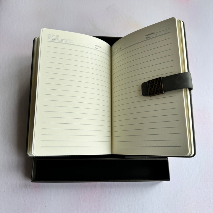 Open notebook with lined pages on a white background