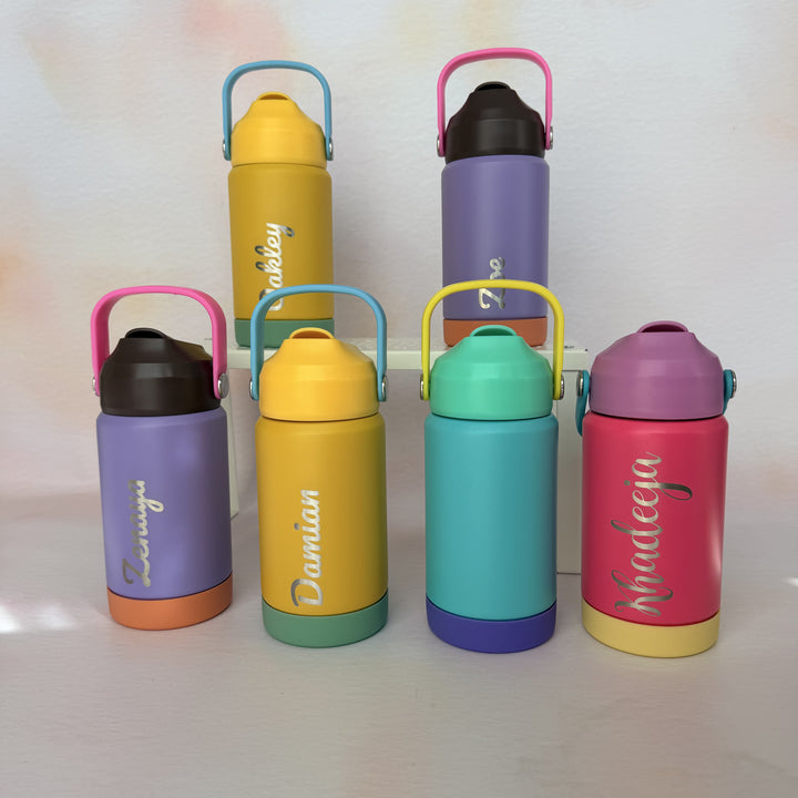 Personalised engraved water bottles in multiple vibrant colours with custom name engraving, reusable drink bottles for kids
