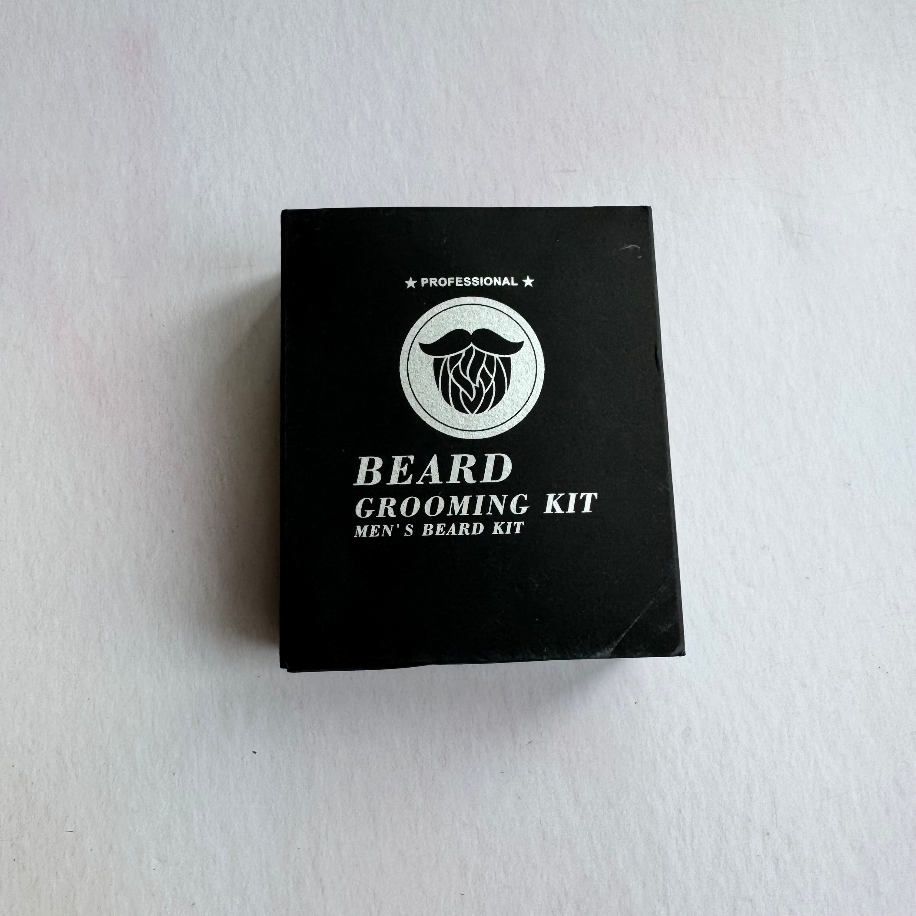 Black box of a beard grooming kit on a white background