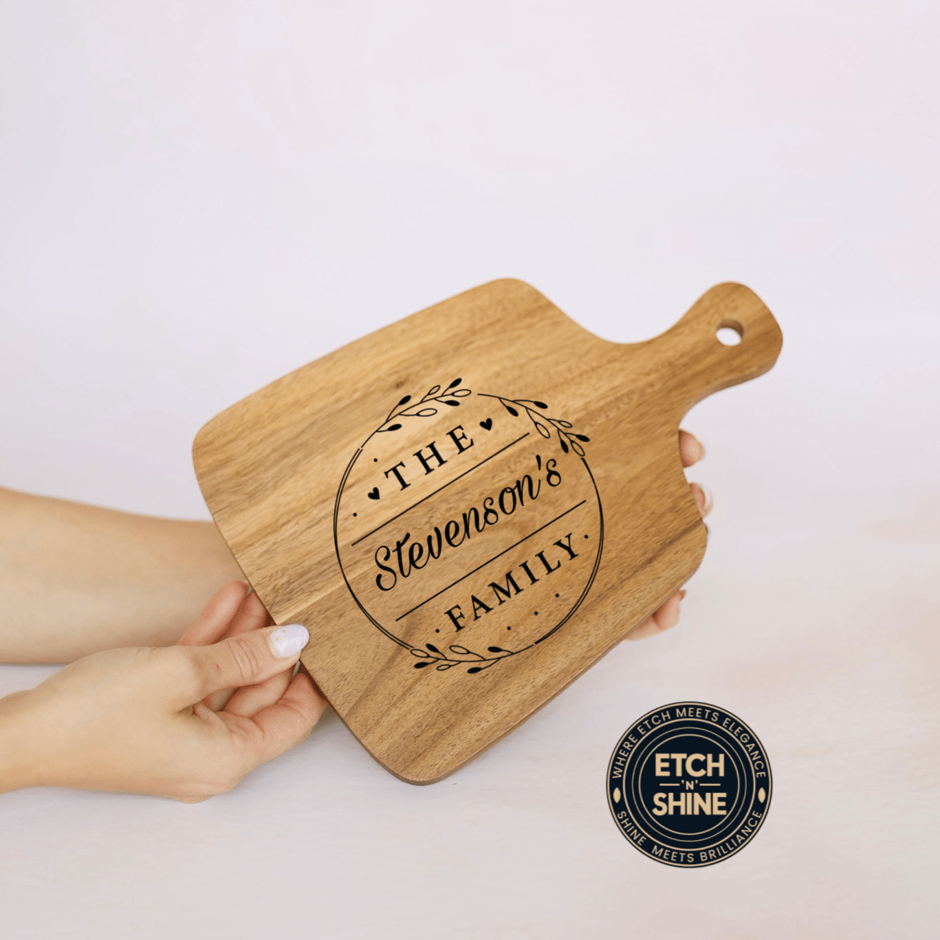 Engraved acacia serving board with custom family name in wreath design – personalised wooden serving board – Etch 'N' Shine