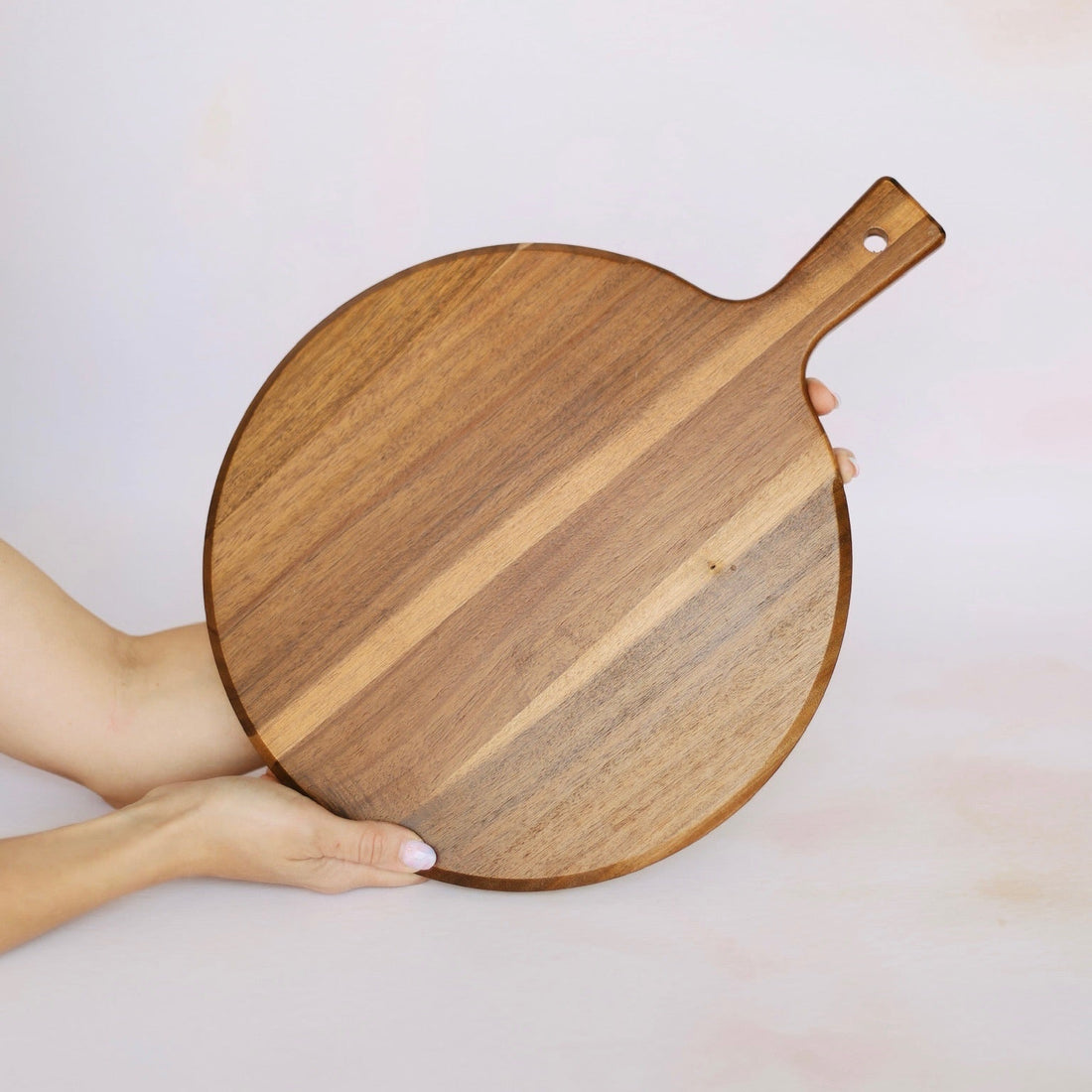 Round acacia wood serving board with handle shown face-up – personalised wooden serving board – Etch 'N' Shine