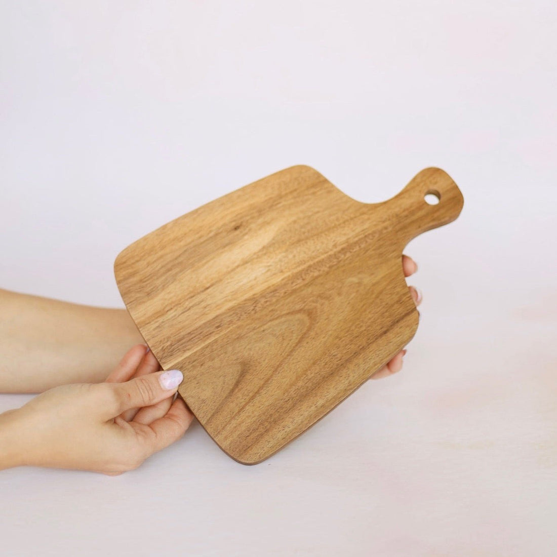 Acacia wood serving board with paddle handle shown face up – personalised wooden serving board – Etch 'N' Shine