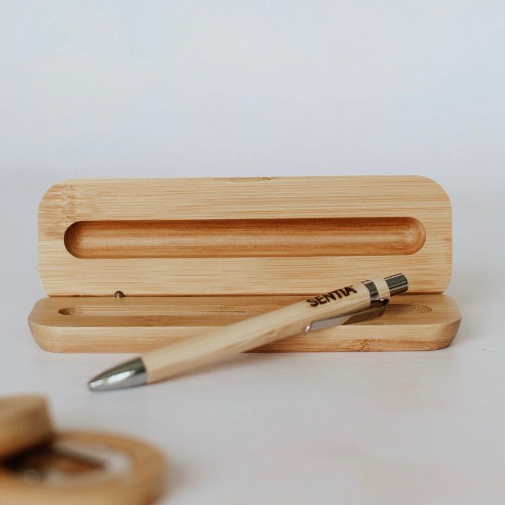 Engraved bamboo pen with custom name resting on open bamboo pen box – personalised bamboo pen set – Etch 'N' Shine