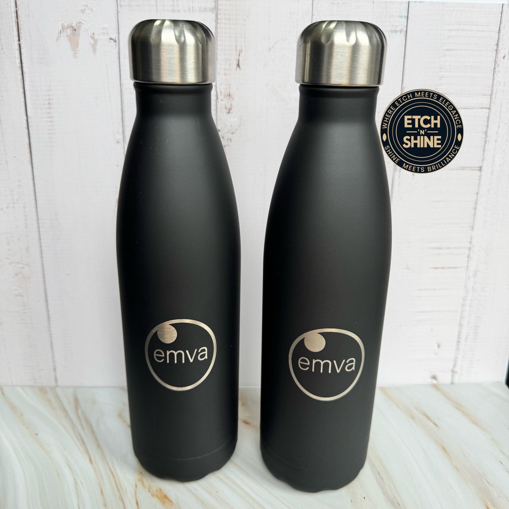 Two matte black bottles with engraved custom logo – personalised stainless steel insulated water bottle – Etch 'N' Shine