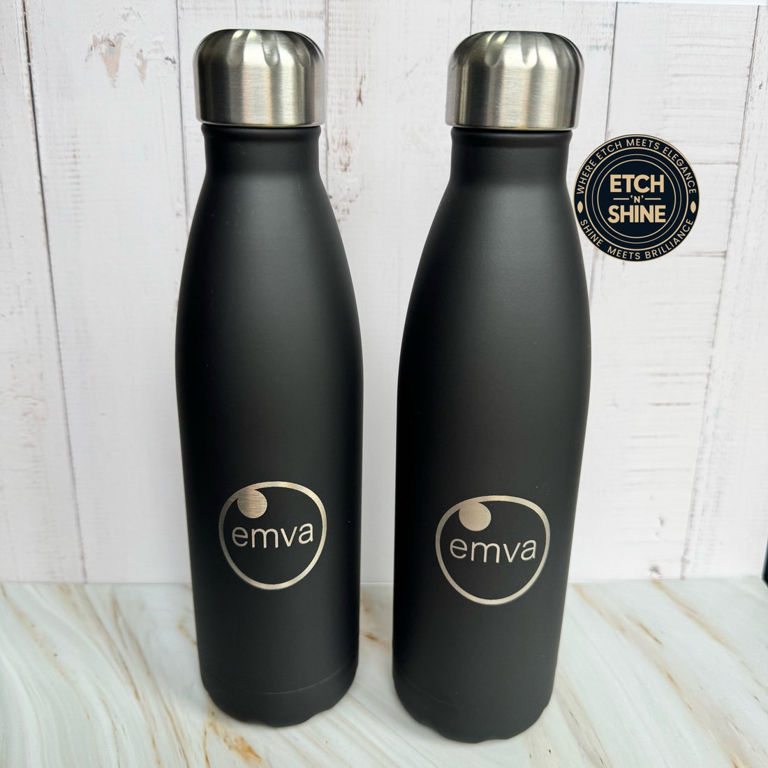 Two matte black bottles with engraved custom logo – personalised stainless steel insulated water bottle – Etch 'N' Shine