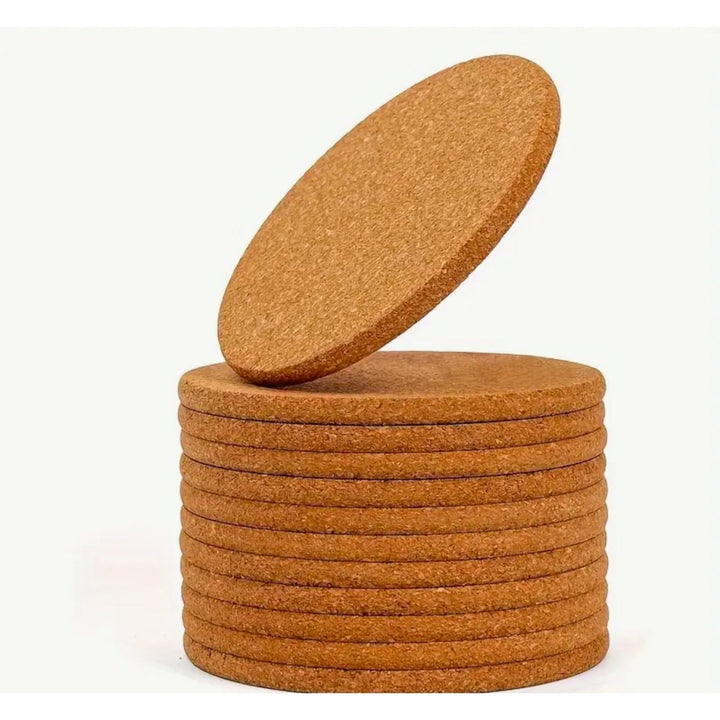 Stack of round cork coasters with one angled on top – personalised cork coaster set – Etch 'N' Shine