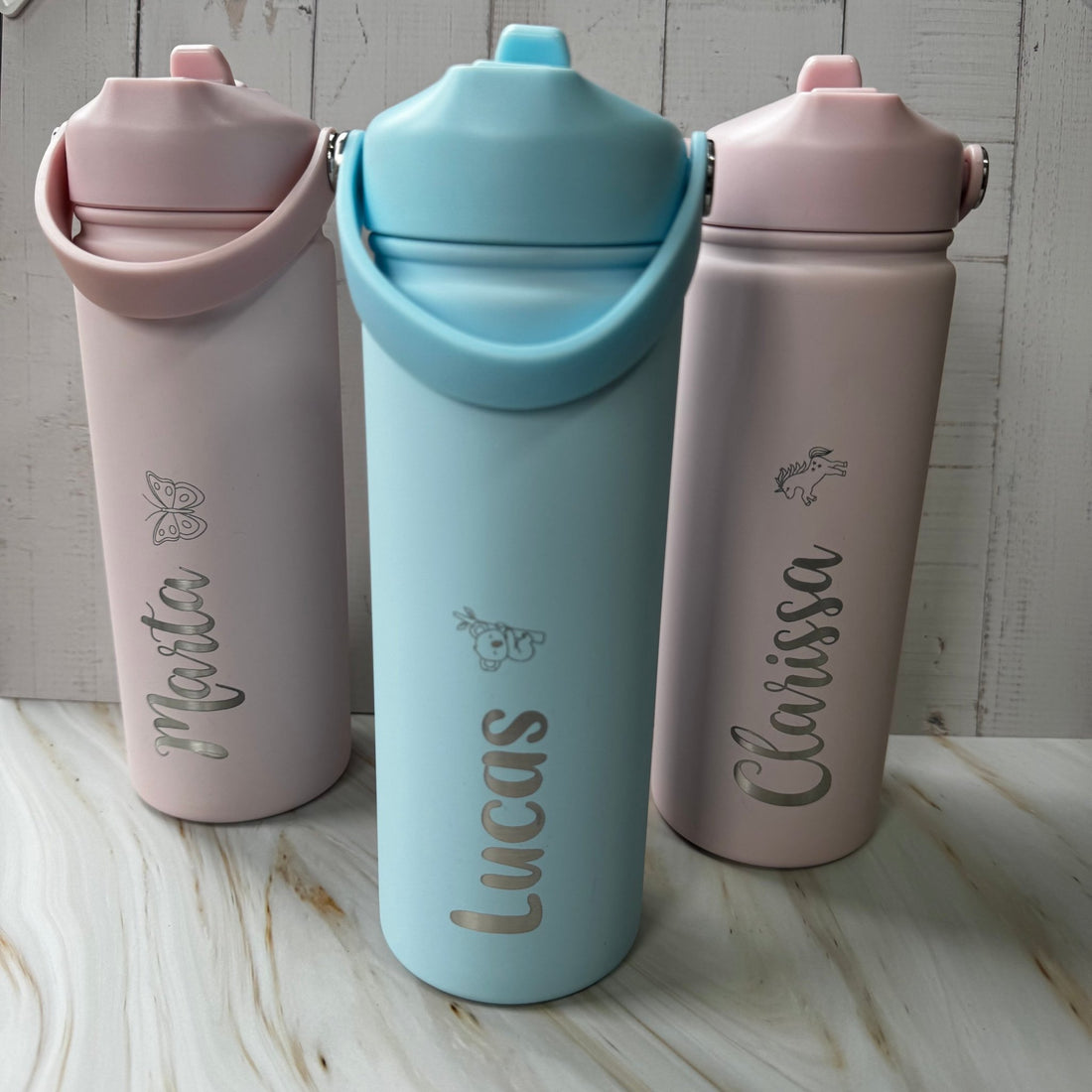 Three colour variants of engraved pastel water bottle with custom name – personalised insulated water bottle – Etch 'N' Shine