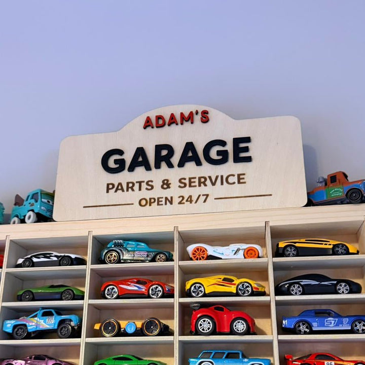 Engraved wooden garage sign with custom name displayed above a toy car shelf – personalised 3D wooden plaque – Etch 'N' Shine