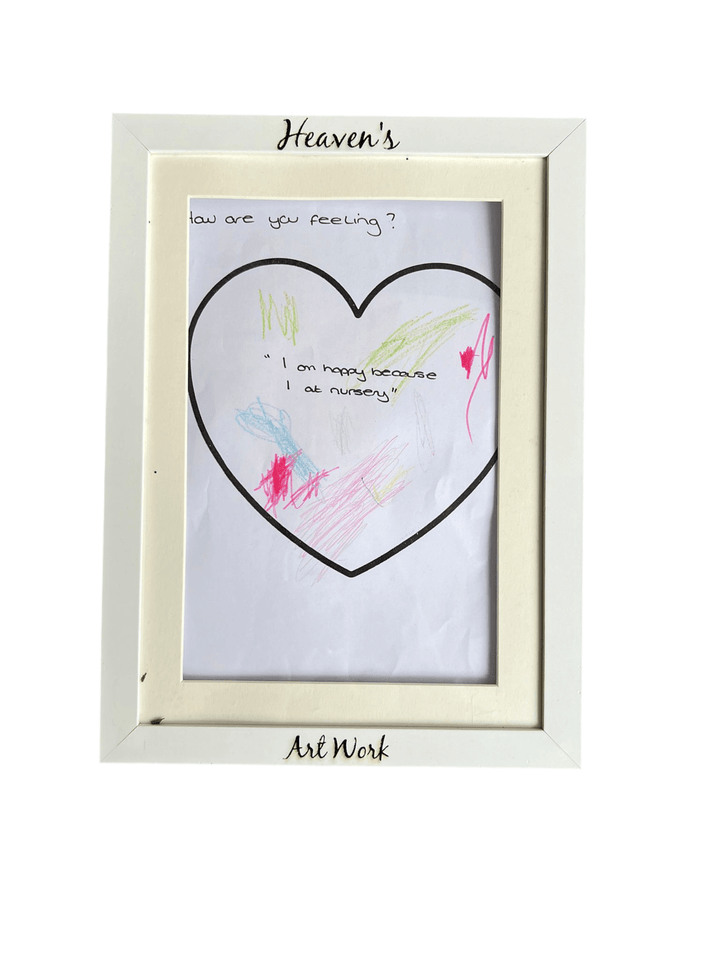 White frame with custom name engraved, holding child's artwork – personalised wood photo frame – Etch 'N' Shine