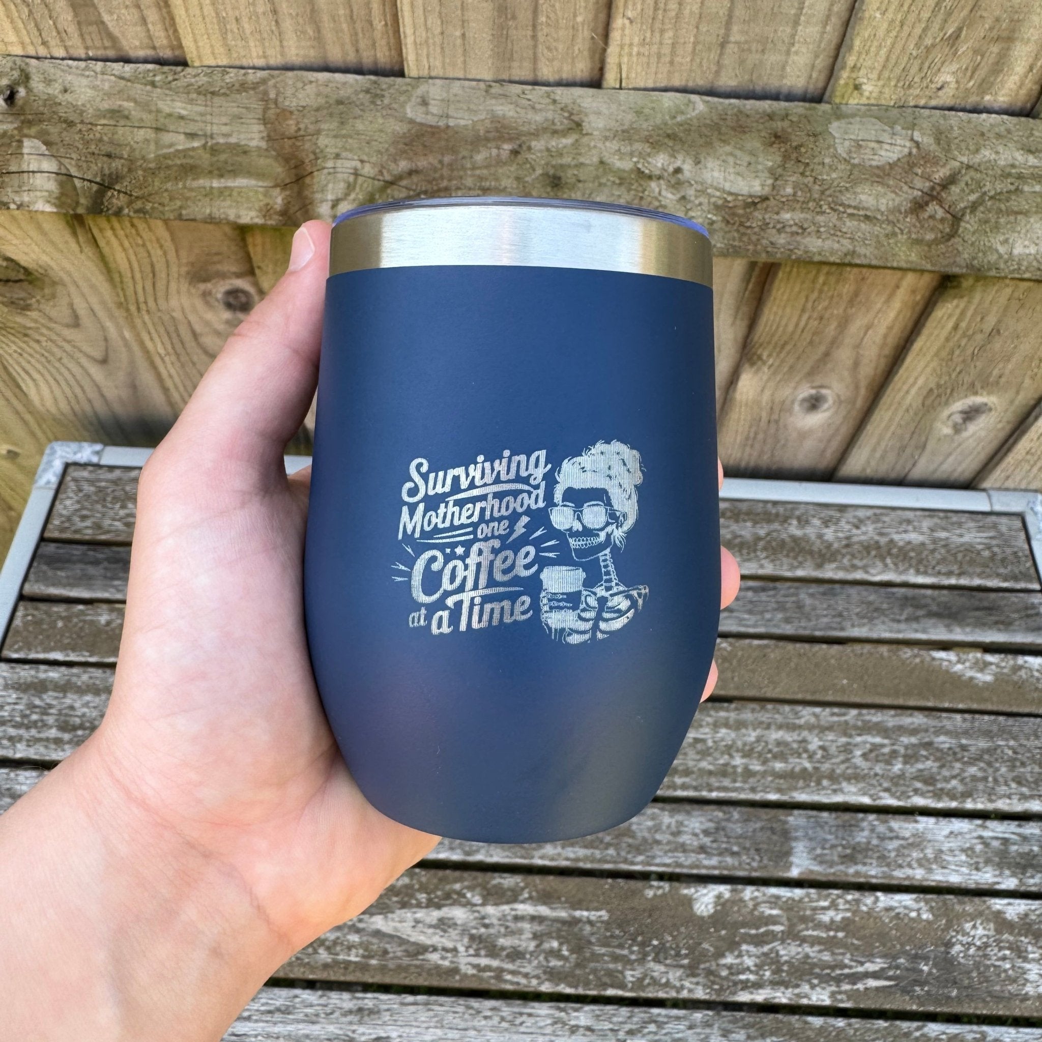 Navy steel tumbler with engraved design held in hand – personalised steel wine tumbler – Etch 'N' Shine