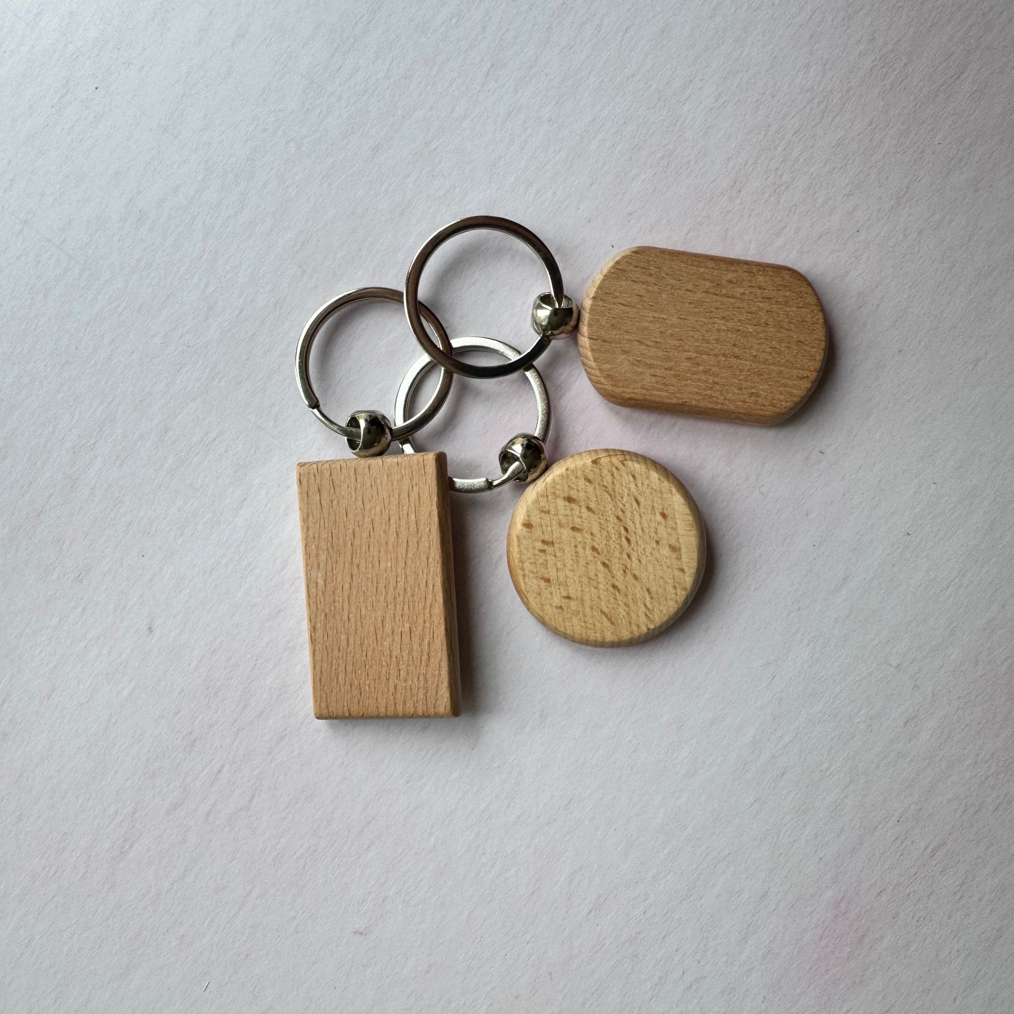 Three shape variants of plain wooden keyring – personalised engraved wooden keyring – Etch 'N' Shine