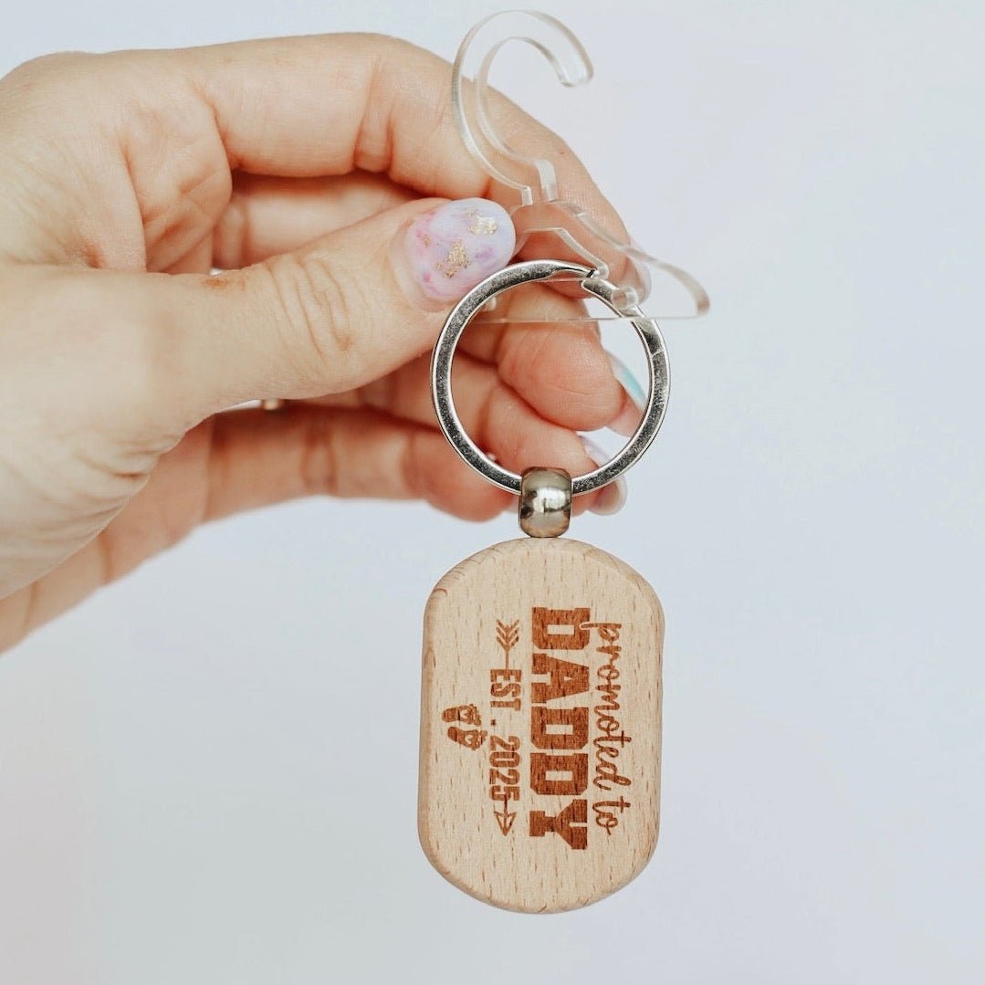 Hand holding engraved wooden keyring with custom text – personalised wooden keyring – Etch 'N' Shine
