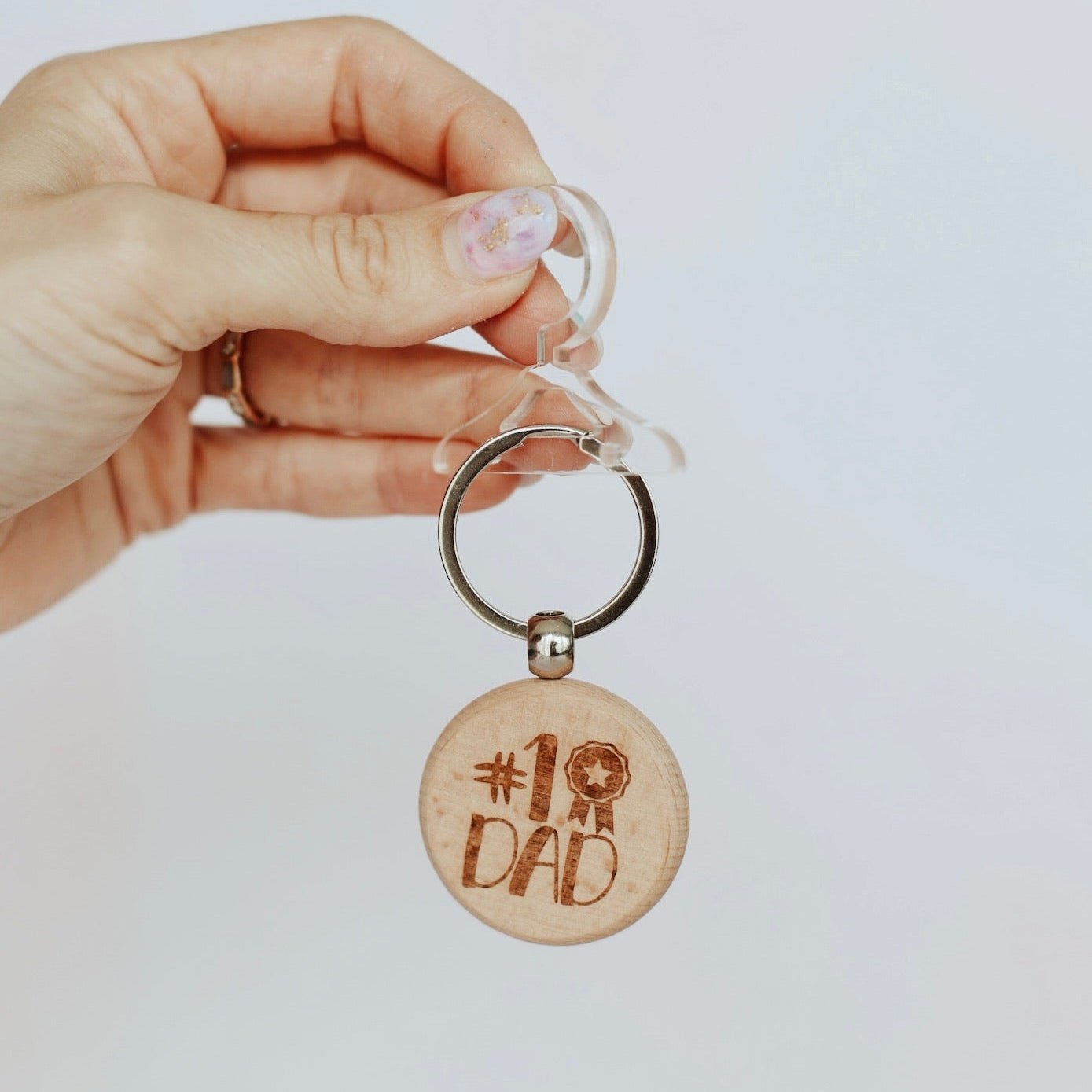 Round engraved wooden disc keyring with custom text and medal icon – personalised wooden keyring – Etch 'N' Shine