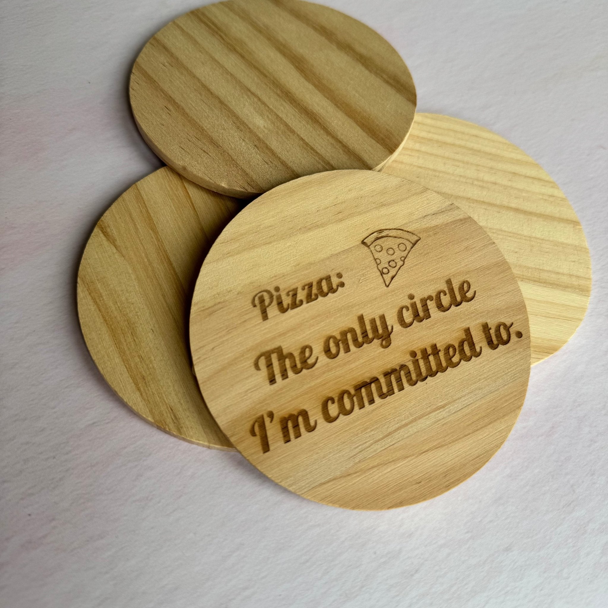 Set of two laser-engraved round wooden coasters with custom text and pizza graphic – wooden coaster set – Etch 'N' Shine