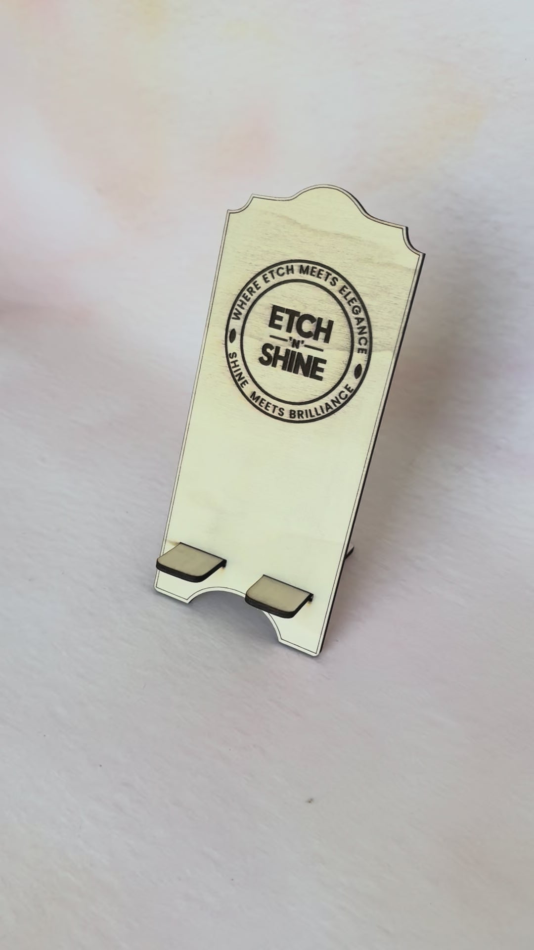 Video of a personalised wooden phone stand in use, second clip – Etch 'N' Shine