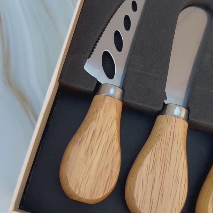 Set of cheese knives in a box