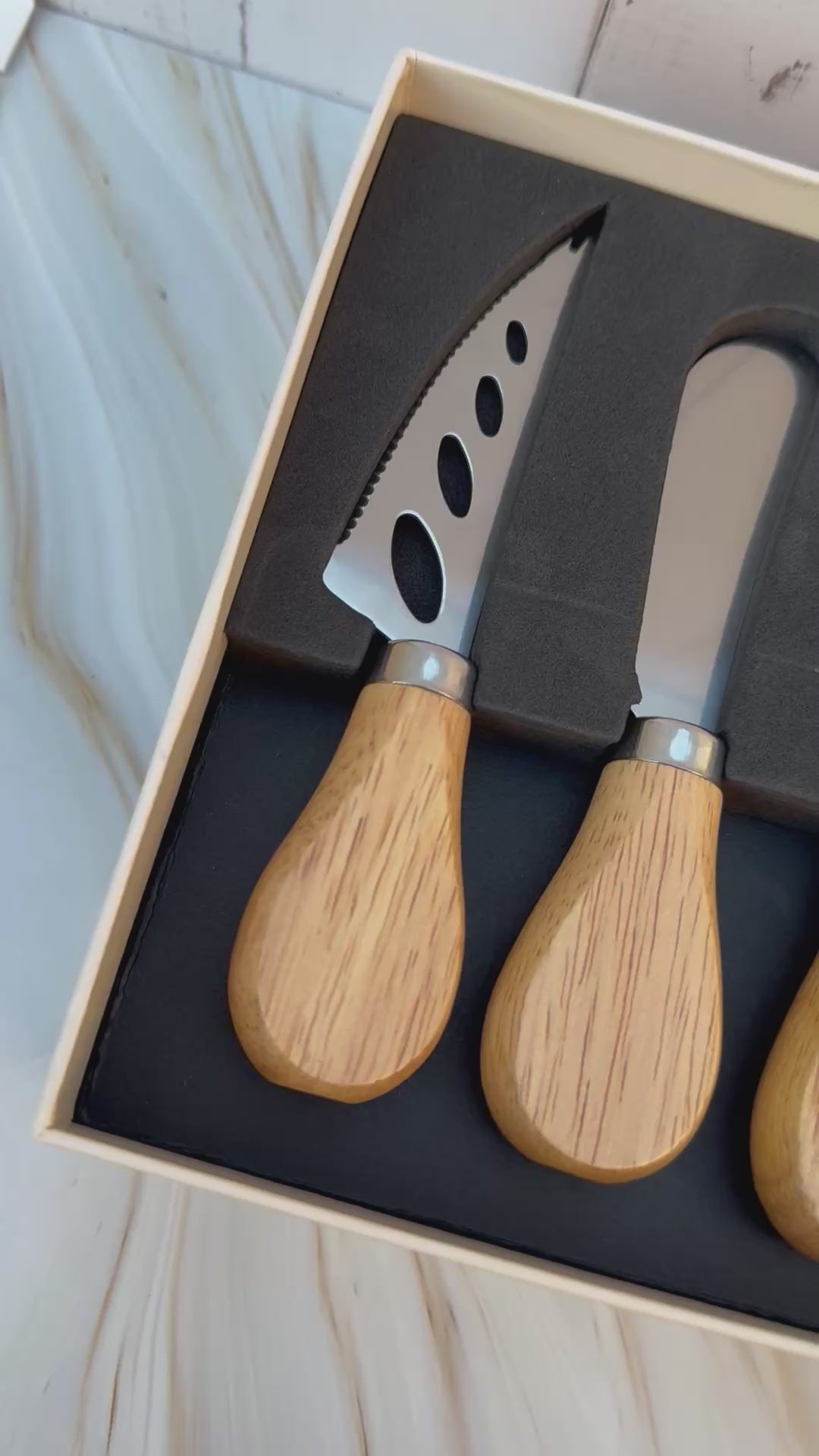 Set of cheese knives in a box