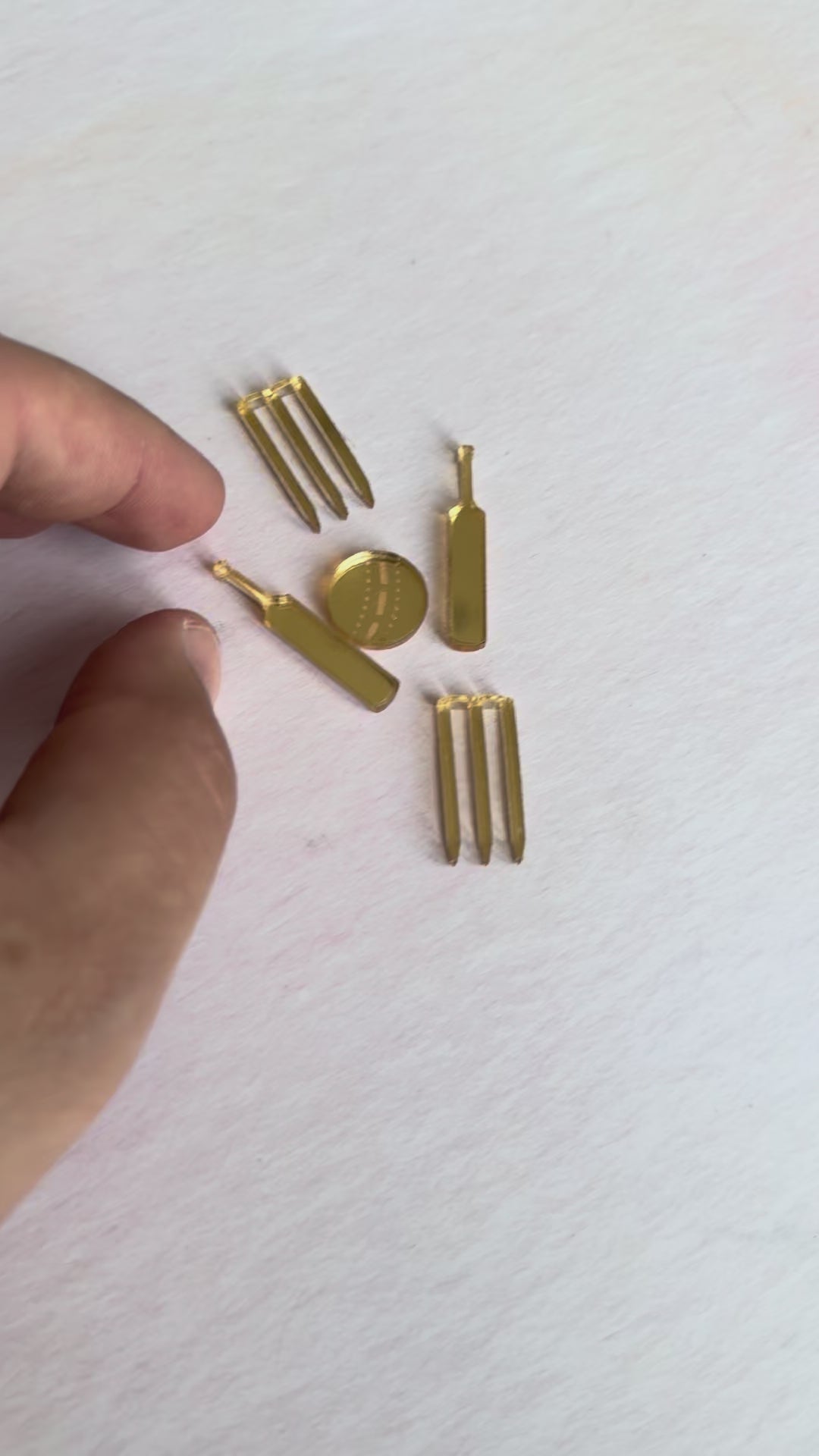 Video of gold acrylic cricket-themed cake topper pieces – bespoke laser-cut topper – Etch 'N' Shine