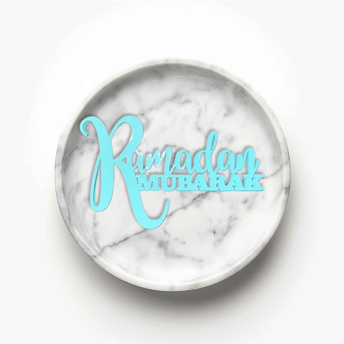 Pastel blue acrylic Ramadan cake topper resting in a marble dish – laser-cut acrylic cake topper – Etch 'N' Shine