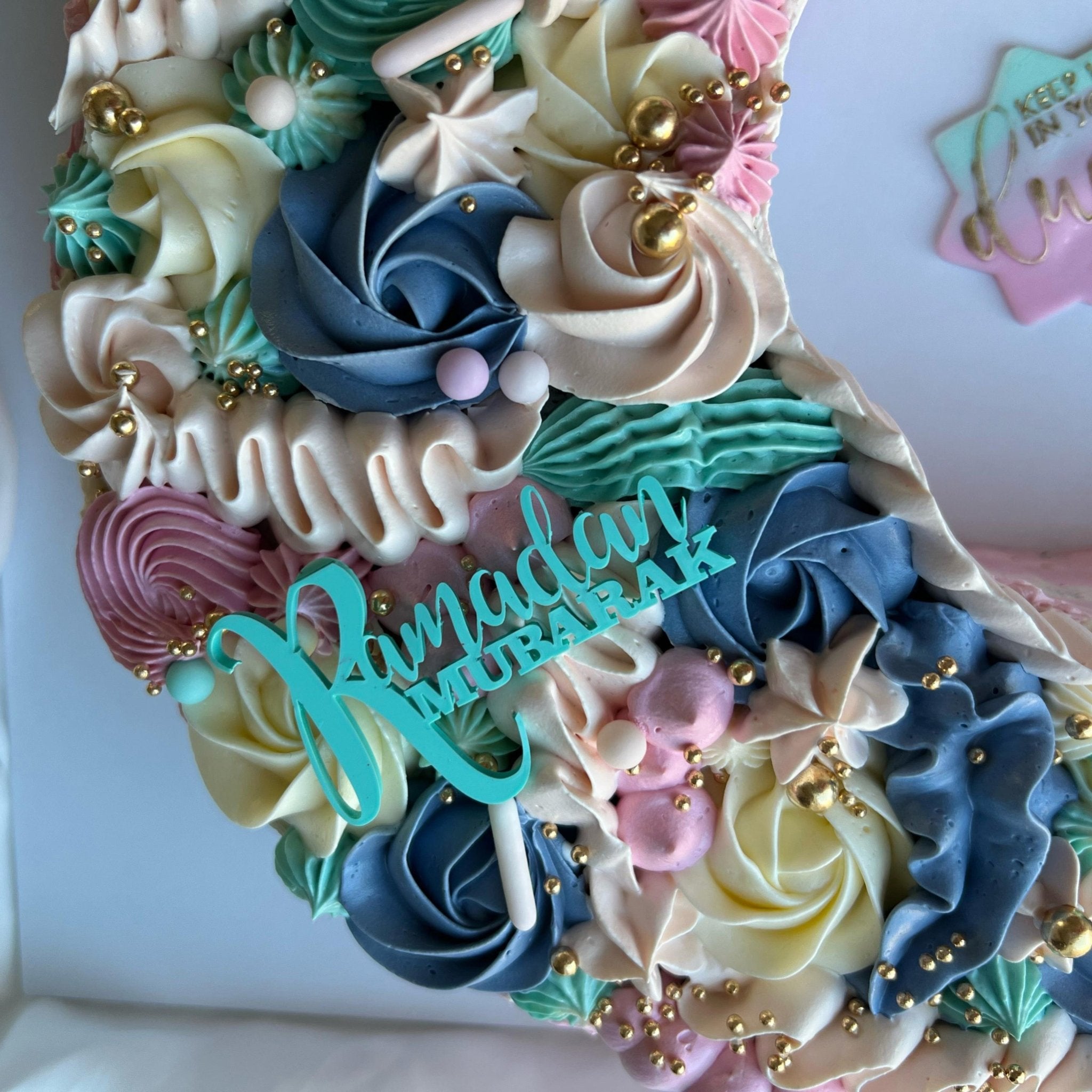 Teal acrylic cake topper with custom text on decorated cake – engraved acrylic cake topper – Etch 'N' Shine