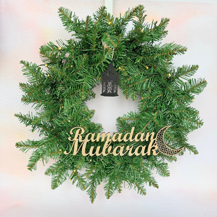 Laser-cut wooden Ramadan Mubarak sign with crescent moon on a green wreath – engraved wooden wall sign – Etch 'N' Shine
