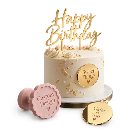 Gold acrylic "Happy Birthday" cake topper with an engraved cake charm and a custom fondant debossing stamp