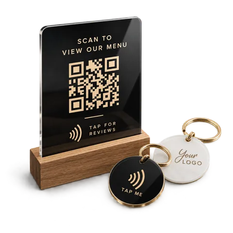 QR code review stand with NFC tap tags and an engraved acrylic keyring