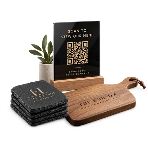 Restaurant QR code table stand with a set of engraved slate coasters and a branded oak serving board